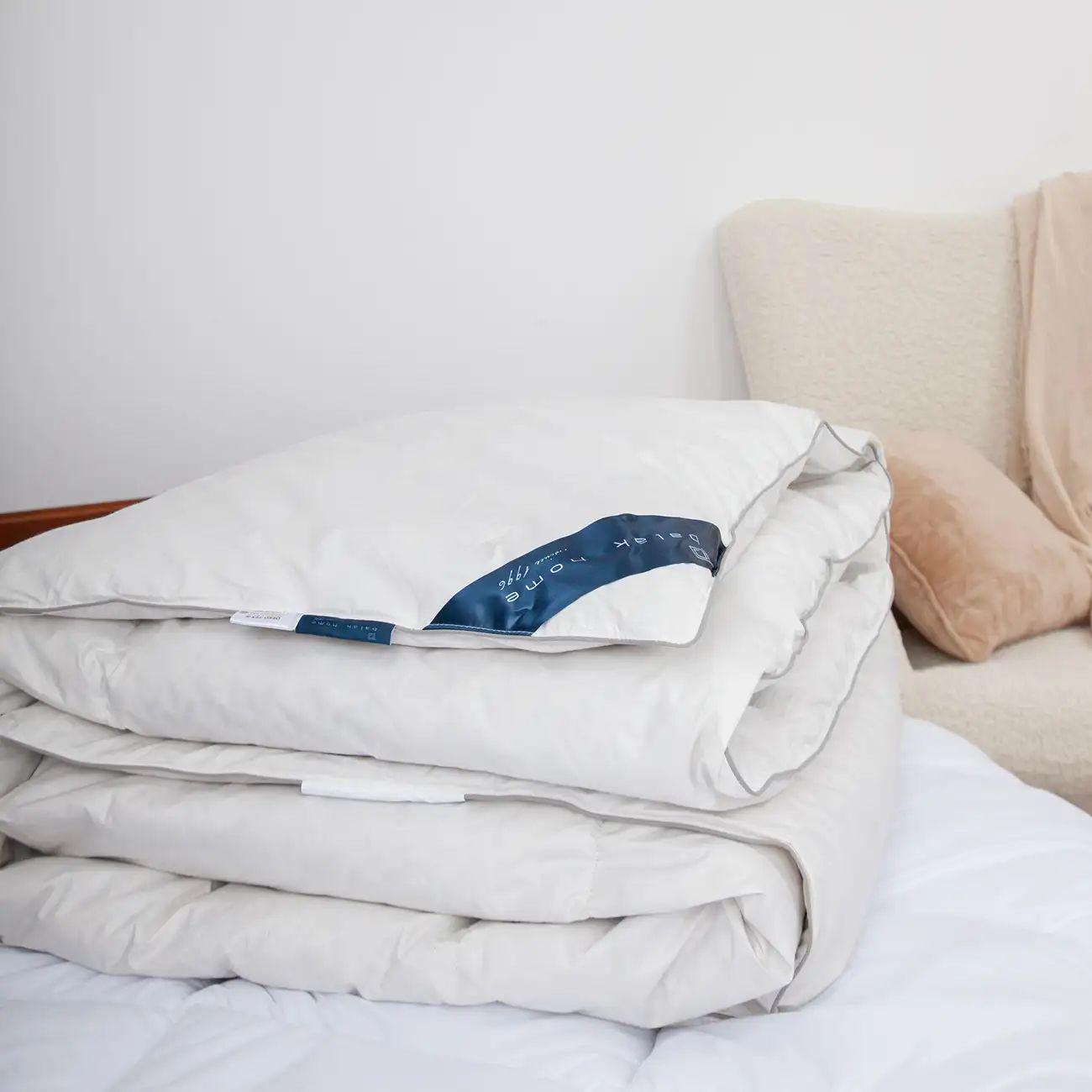 Ковдра зимова гіпоалергенна ТЕП Feather пухова 250 г/кв. м євро 200x210 см Білий (26380200210)