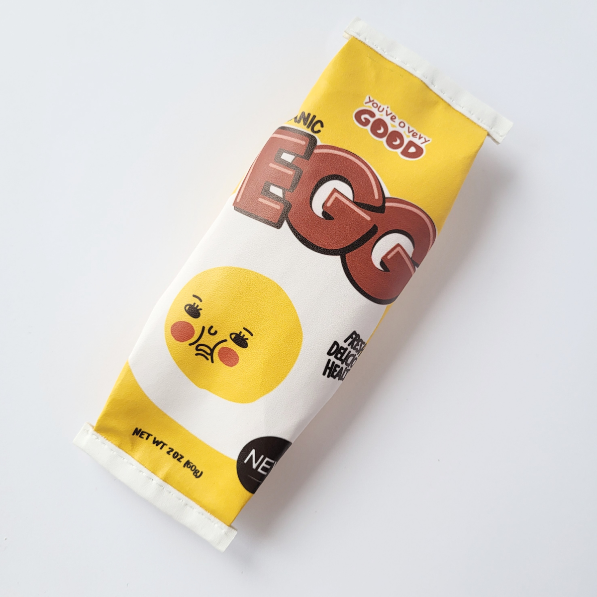 Пенал школьный Пакет с яйцом Egg Organic из искусственной кожи Желтый (122)