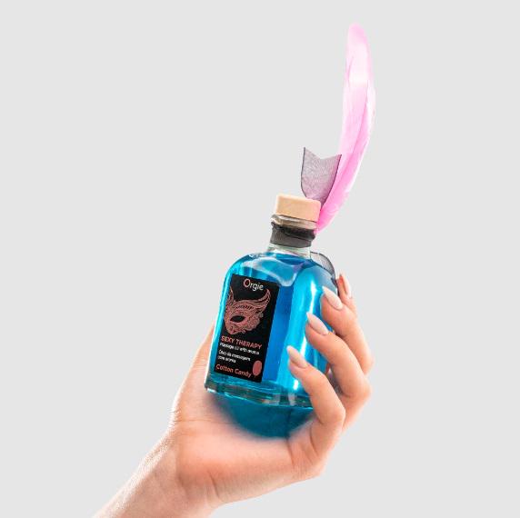 Набір їстівний Orgie Цукрова вата масажна олія з пером - фото 4 Набір їстівний Orgie Цукрова вата масажна олія з пером - фото 4