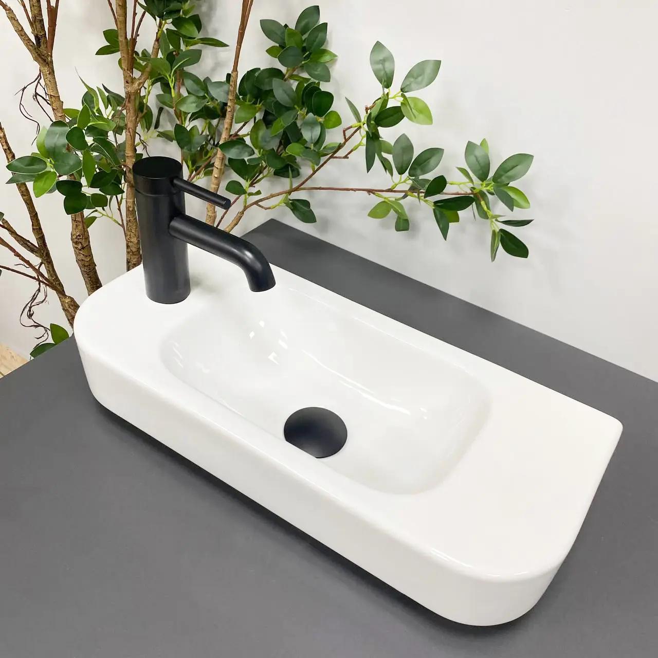 Раковина підвісна VBI Aprilia R прямокутна 220x505 мм Білий (VBI-015607) - фото 4 Раковина підвісна VBI Aprilia R прямокутна 220x505 мм Білий (VBI-015607) - фото 4