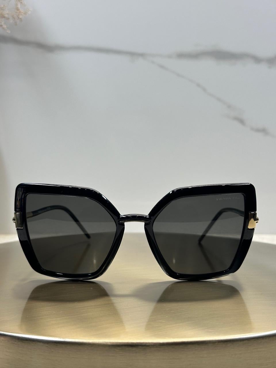 Солнцезащитные очки Prada PR 09WS 1AB5S0 Black/Grey