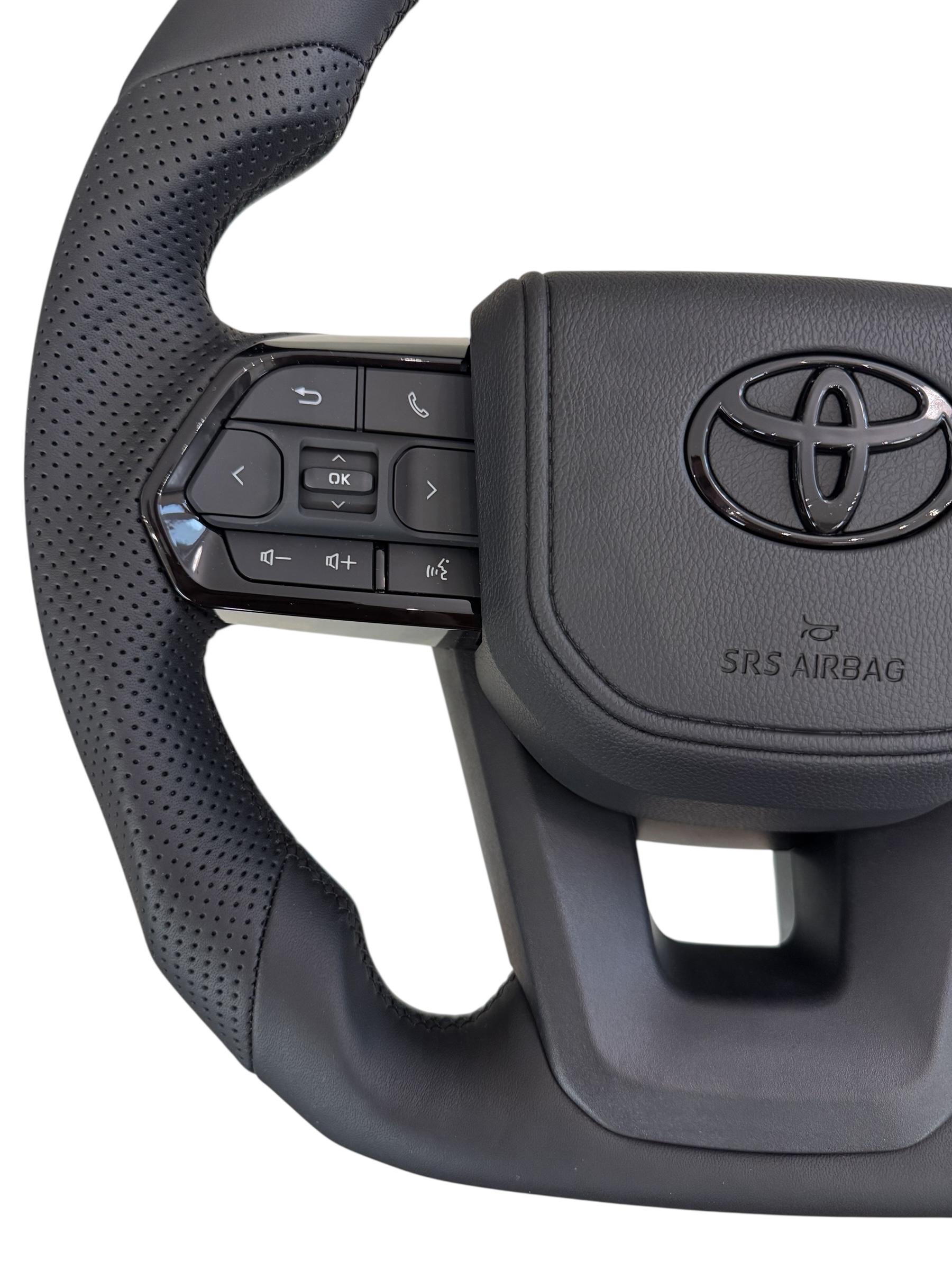 Кермо для Toyota Sequoia в сборі шкіра зі скошеним низом логотип чорний глянець (29371344) - фото 2 Кермо для Toyota Sequoia в сборі шкіра зі скошеним низом логотип чорний глянець (29371344) - фото 2