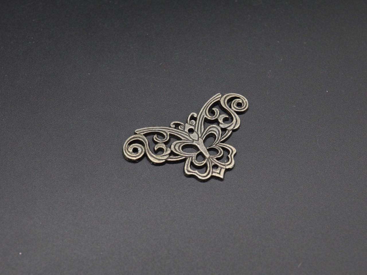 Уголок декоративный накладной бабочка 57х33 мм Черный (38964583)