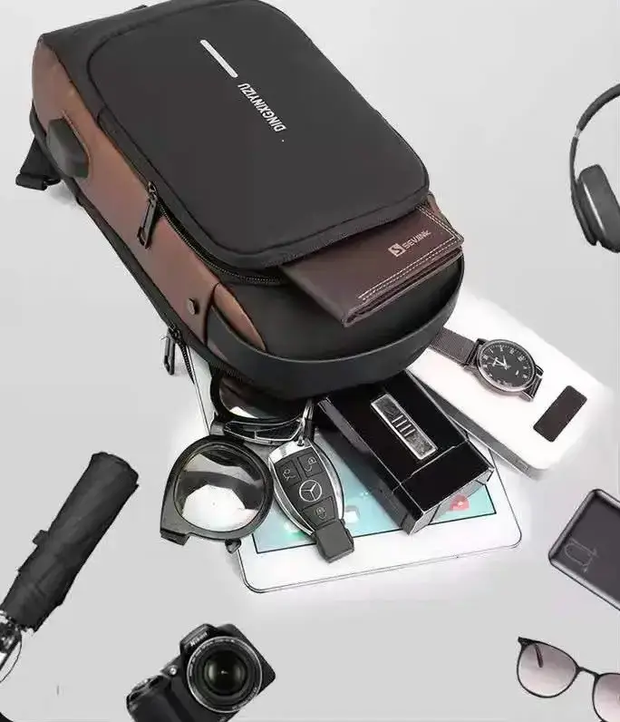 Сумка нагрудна чоловіча водонепроникна USB Чорний з коричневим (29697215) - фото 8 Сумка нагрудна чоловіча водонепроникна USB Чорний з коричневим (29697215) - фото 8