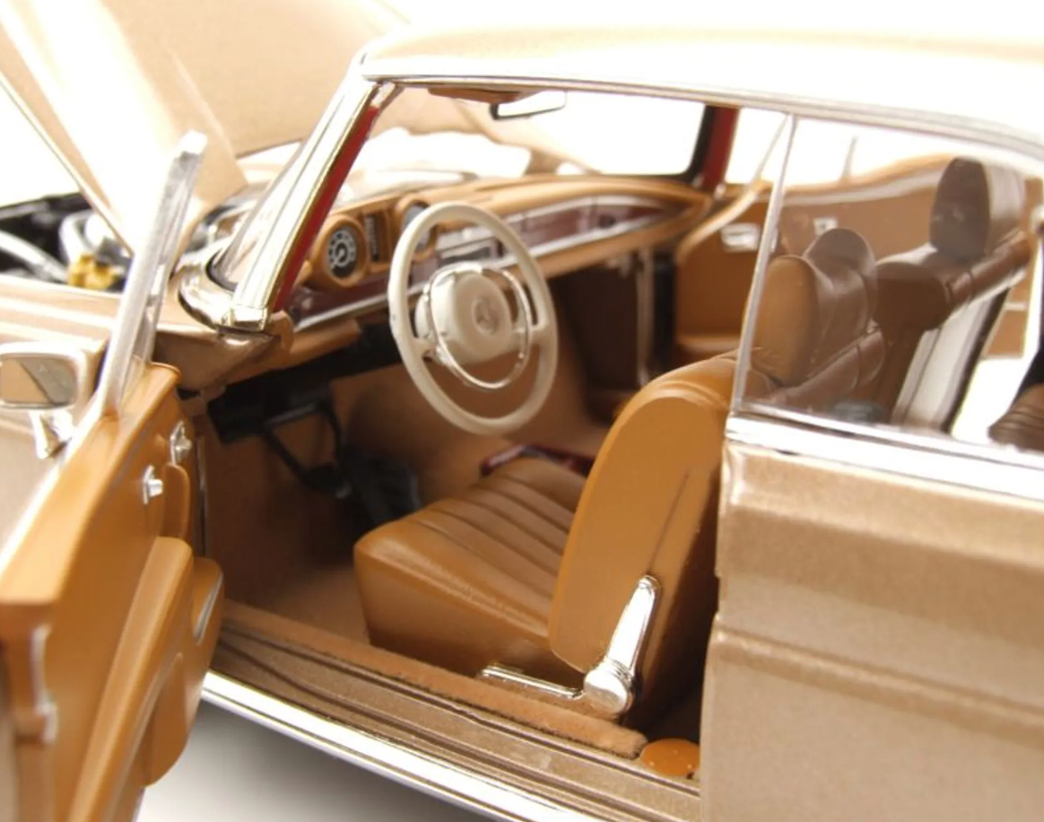 Модель автомобиля Norev 1:18 Mercedes-Benz 250 Coupe SE Gold Metallic (183759) - фото 5 Модель автомобиля Norev 1:18 Mercedes-Benz 250 Coupe SE Gold Metallic (183759) - фото 5