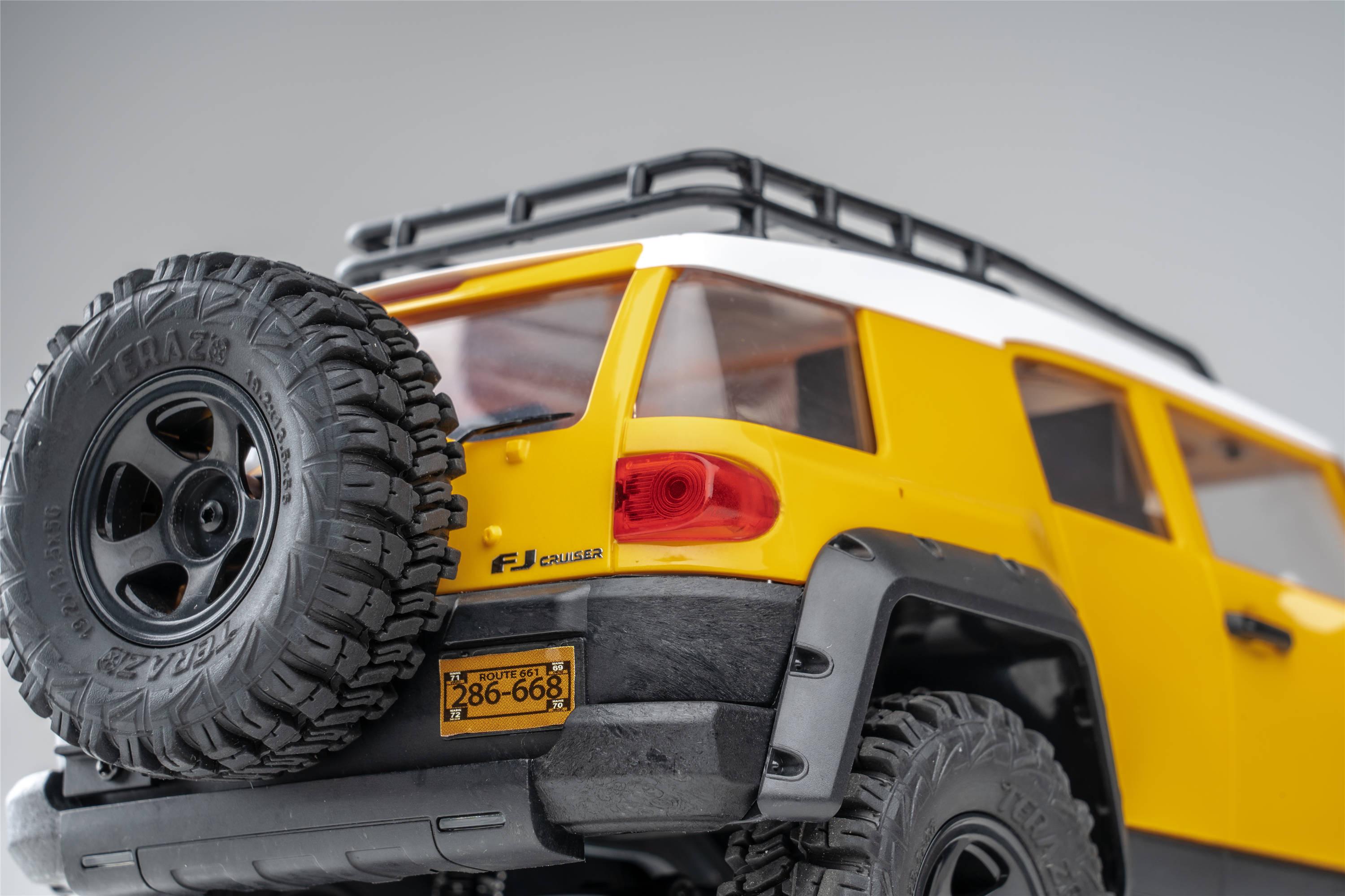 Машинка на радиоуправлении FMS 1:18 FJ Cruiser RTR Yellow - фото 34 Машинка на радиоуправлении FMS 1:18 FJ Cruiser RTR Yellow - фото 34