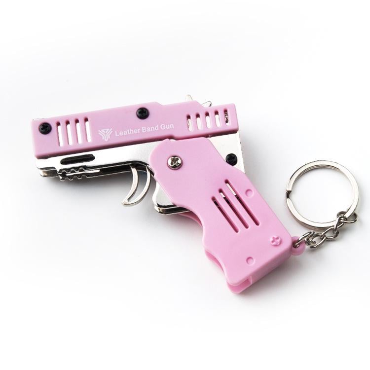 Пистолет-брелок складной стреляет резинками Розовый (0160)