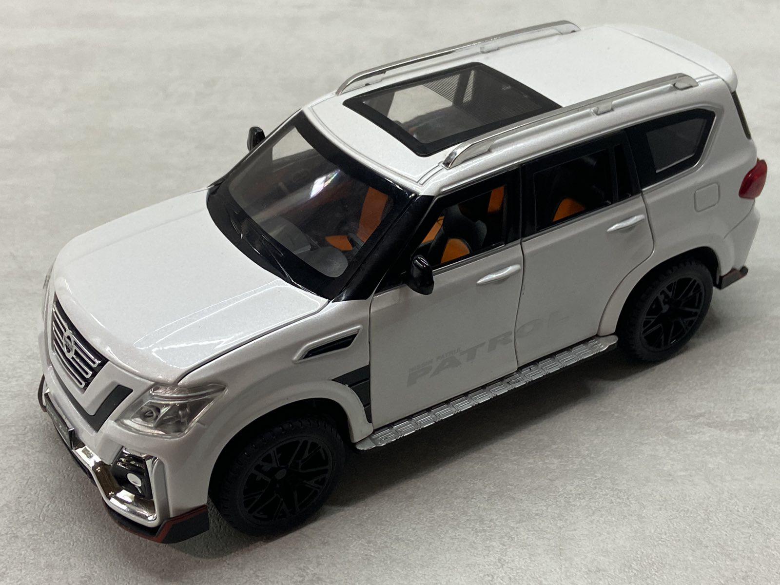 Машинка TK Union Group Nissan Patrol інерційна звук/світло 1:24 Білий (GT-0936)