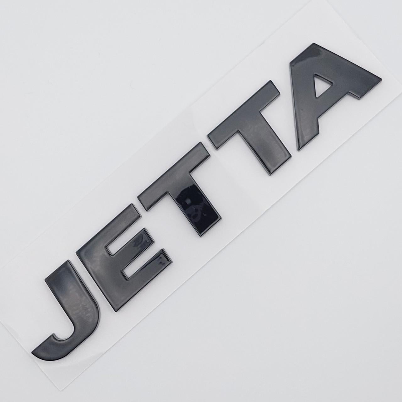 Эмблема надпись Jetta на заднюю часть Volkswagen Черный глянцевый (1737294429)