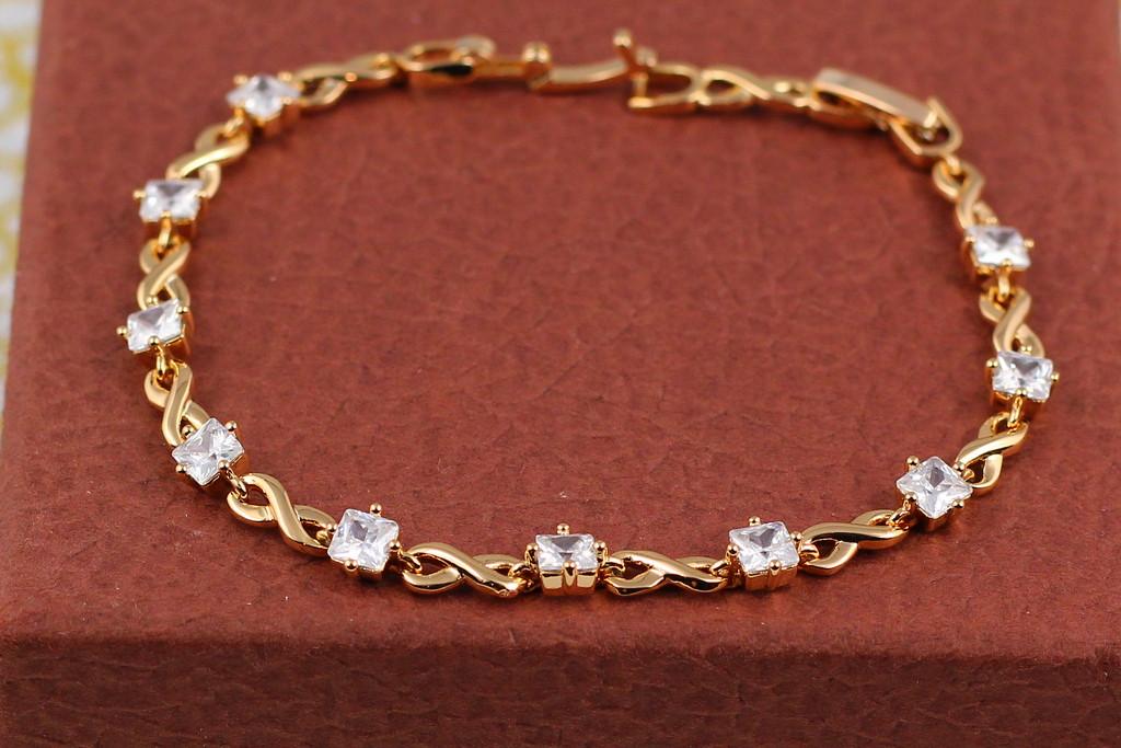 Браслет Xuping Jewelry восьмерки с белыми квадратными камнями 21 см х 5 мм Золотистый (2290710252)