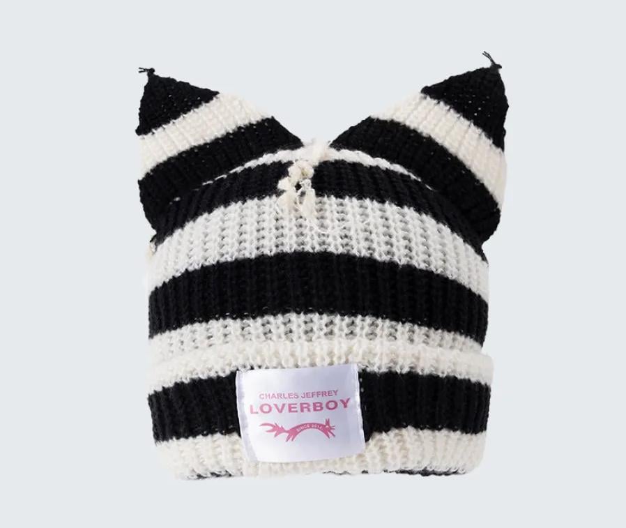 Шапка кішечка із вушками та нашивкою one size Чорно-білий