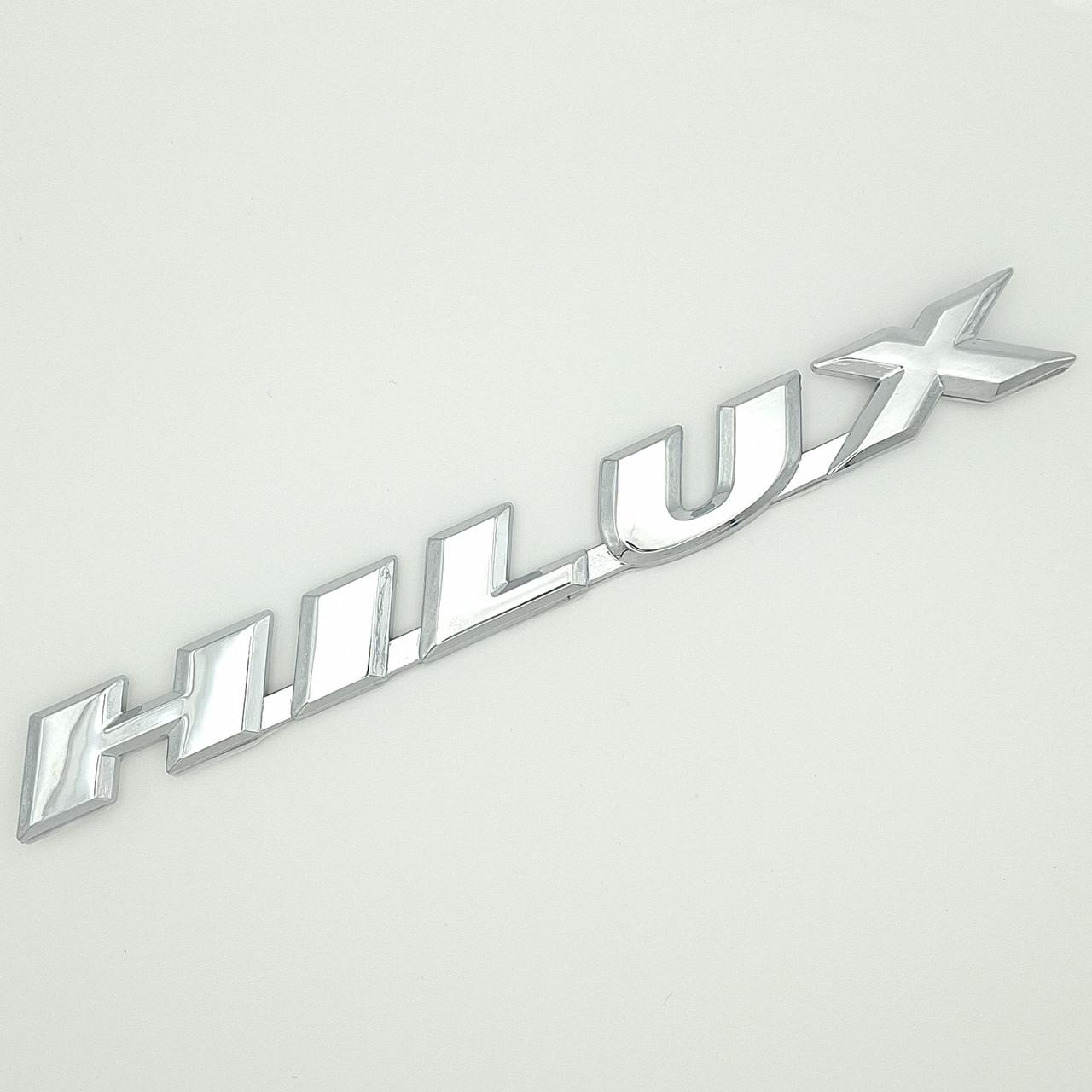 Эмблема надпись Hilux Toyota ABS 16,3х1,7 см Хром глянцевый (2671832359)