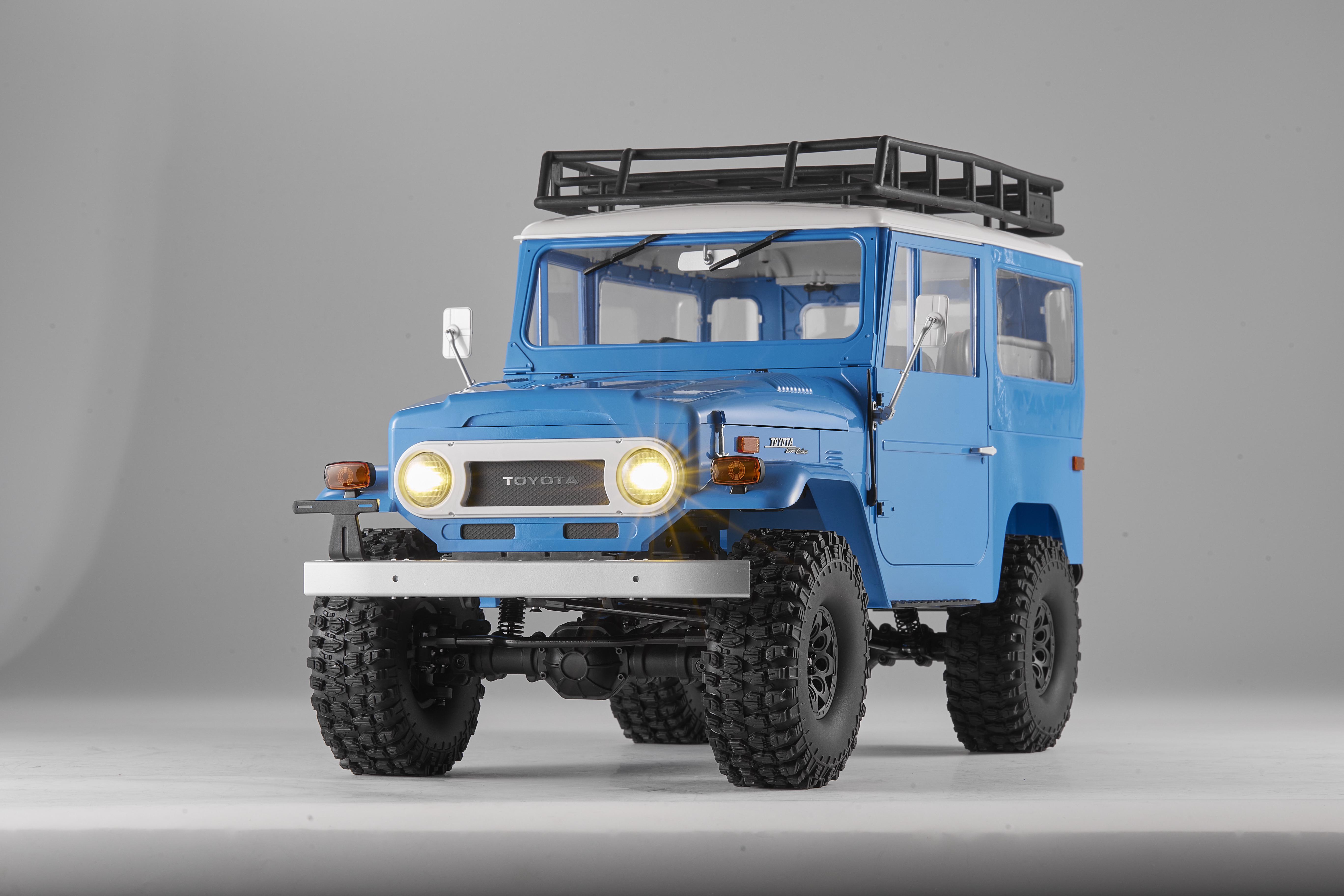 Машинка на радиоуправлении FMS 1:10 Toyota Land Cruiser FJ40 RS Blue - фото 8 Машинка на радиоуправлении FMS 1:10 Toyota Land Cruiser FJ40 RS Blue - фото 8