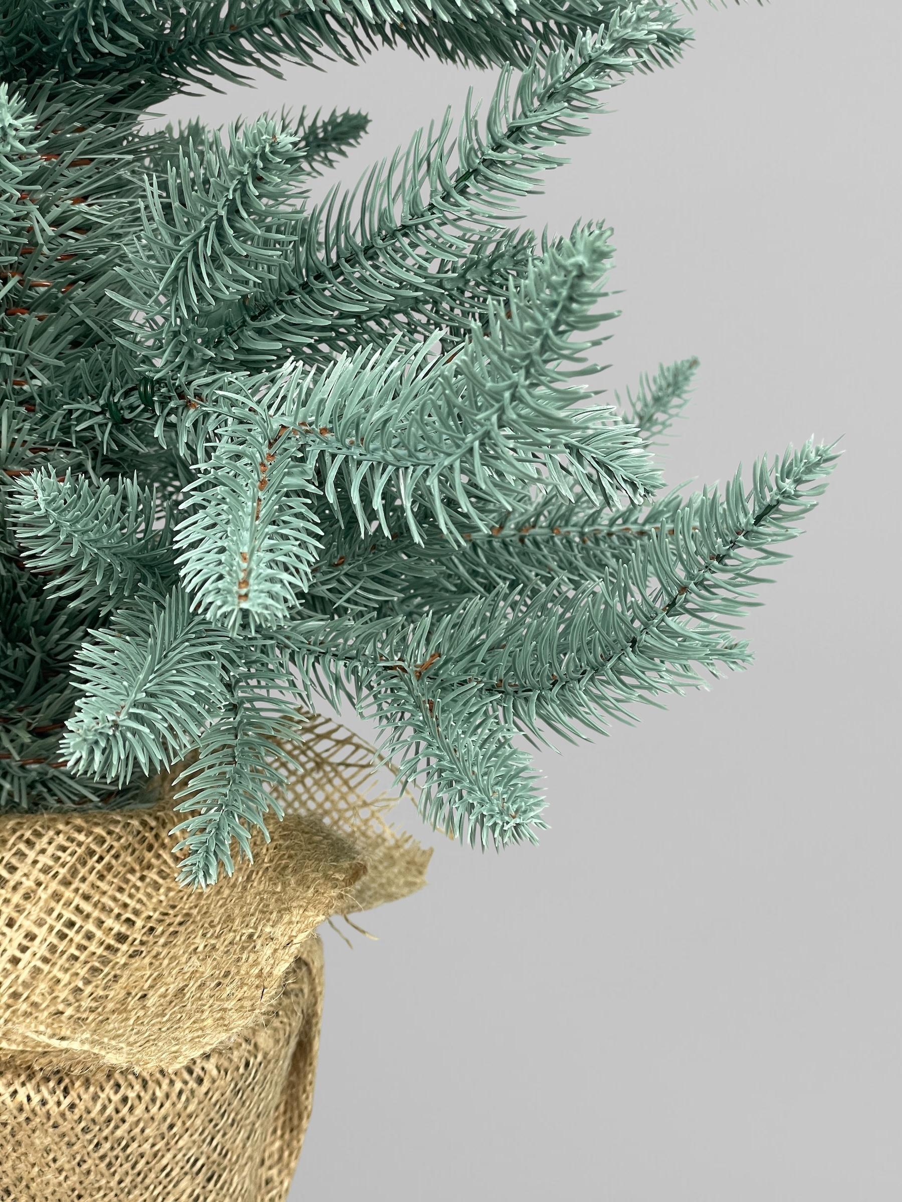 Искусственная елка литая Classic в горшке с мешковиной 70 см Голубой (Н01012) - фото 12 Искусственная елка литая Classic в горшке с мешковиной 70 см Голубой (Н01012) - фото 12