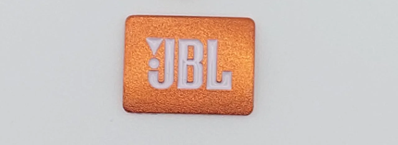 Эмблема JBL на сетку динамика 2х1,5 см Оранжевый (1670546750)