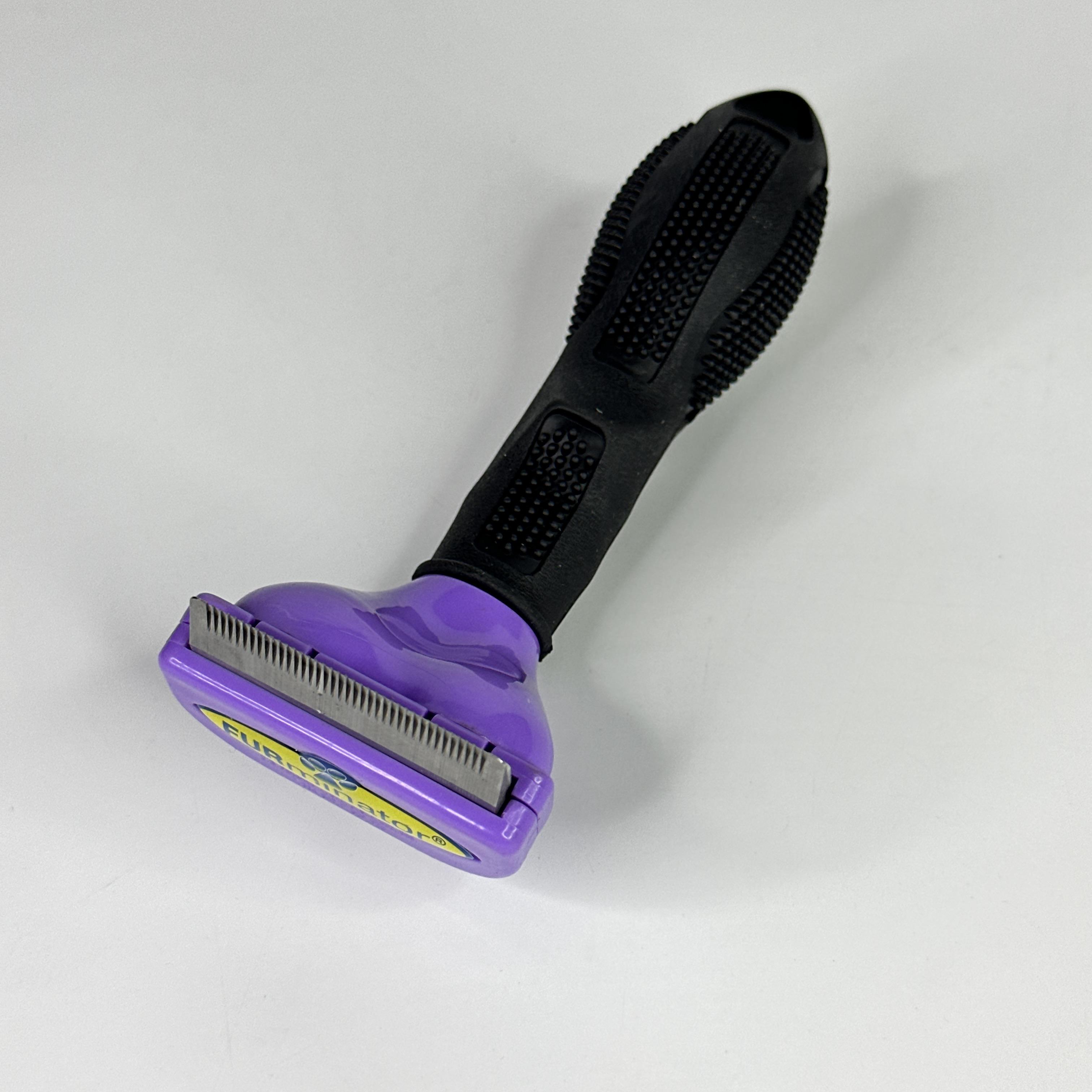 Фурминатор для собак длинношерстных малых пород Furminator с лезвием 4,5 см Фиолетовый (FDL-45-Violet) - фото 5 Фурминатор для собак длинношерстных малых пород Furminator с лезвием 4,5 см Фиолетовый (FDL-45-Violet) - фото 5