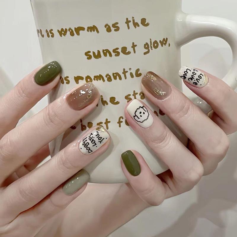 Накладные ногти Doggy с рисунками и надписями с клеем Bananahall 24 шт. LK13476 Зеленый (A9761) - фото 2 Накладные ногти Doggy с рисунками и надписями с клеем Bananahall 24 шт. LK13476 Зеленый (A9761) - фото 2