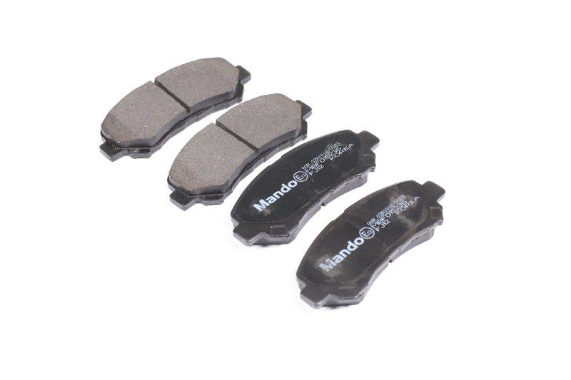 Колодки тормозные дисковые MANDO Nissan Qashqai teana X-Trail передние (MBF015236)