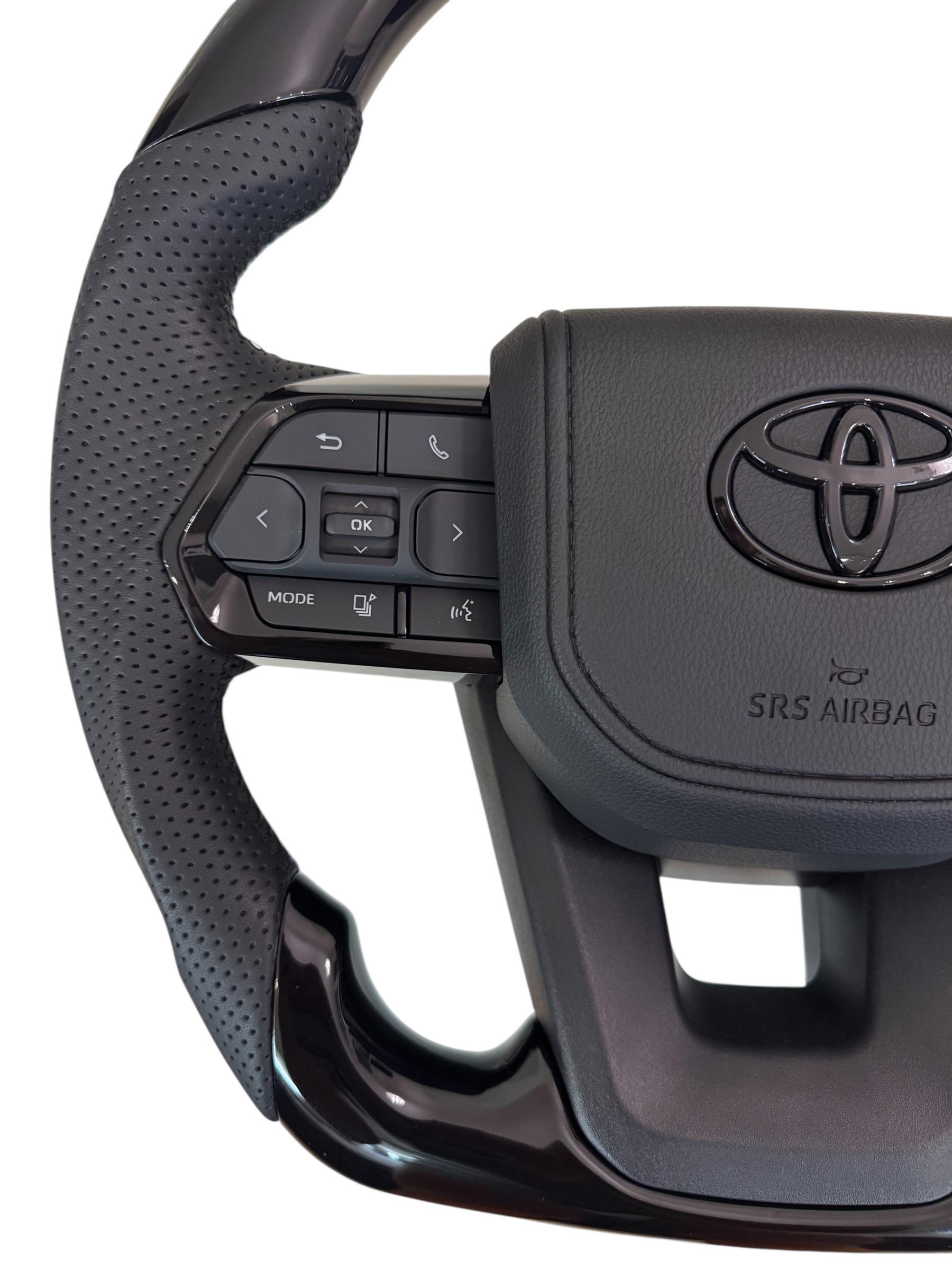 Кермо для Toyota Tundra в сборі рояльний лак зі скошеним низом логотип чорний глянець (29367413) - фото 2 Кермо для Toyota Tundra в сборі рояльний лак зі скошеним низом логотип чорний глянець (29367413) - фото 2