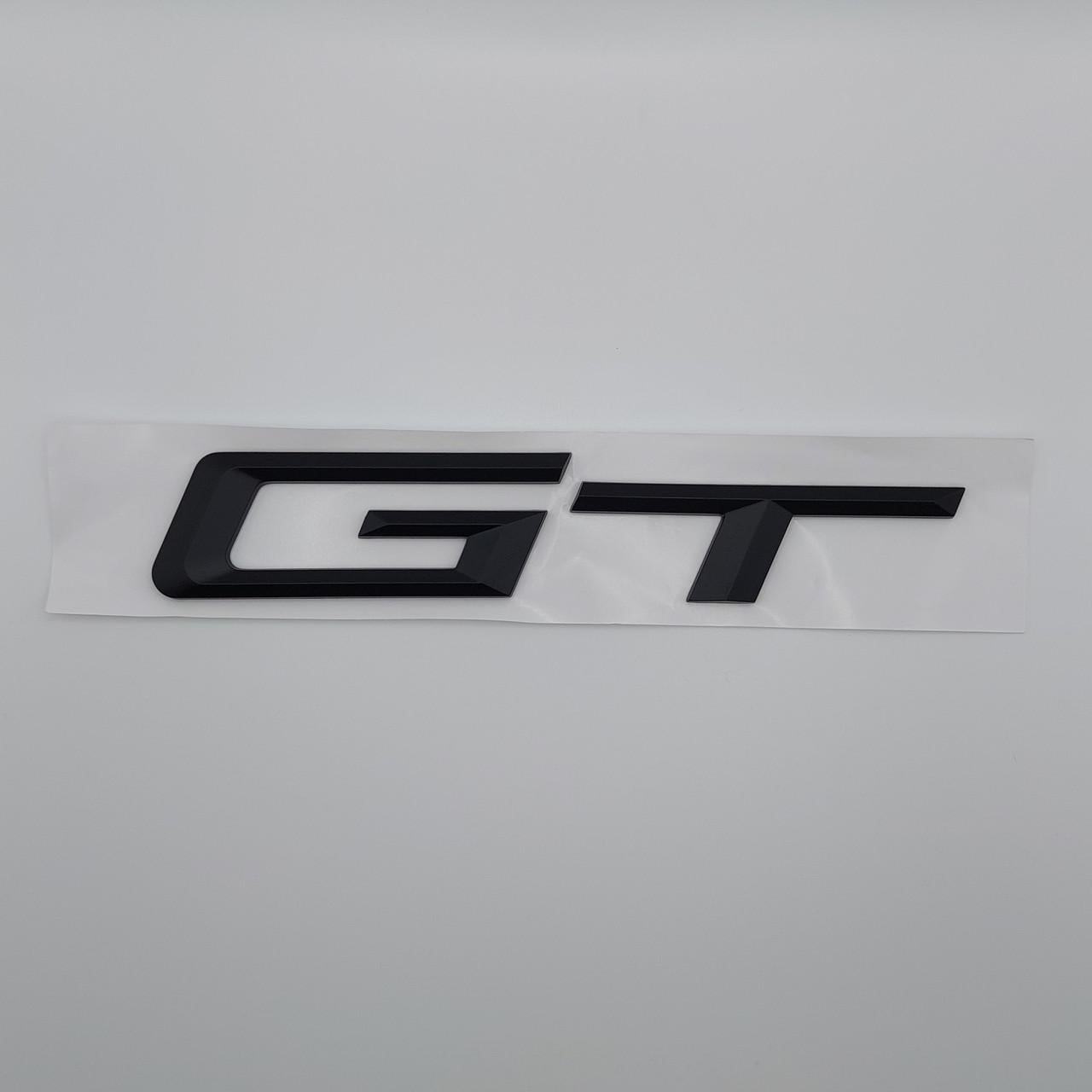 Эмблема надпись GT на крышку багажника BMW 16,5х3 см ABS Черный глянцевый (1725997357)