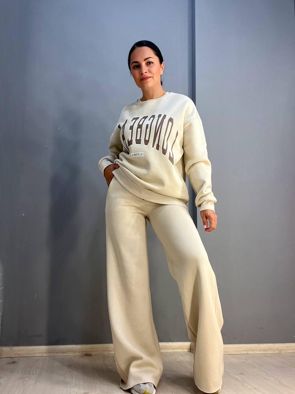 Костюм жіночий QUZEN 388-488 світшот брюки палаццо широкі на флісі M Світло-бежевий (852) - фото 4 Костюм жіночий QUZEN 388-488 світшот брюки палаццо широкі на флісі M Світло-бежевий (852) - фото 4