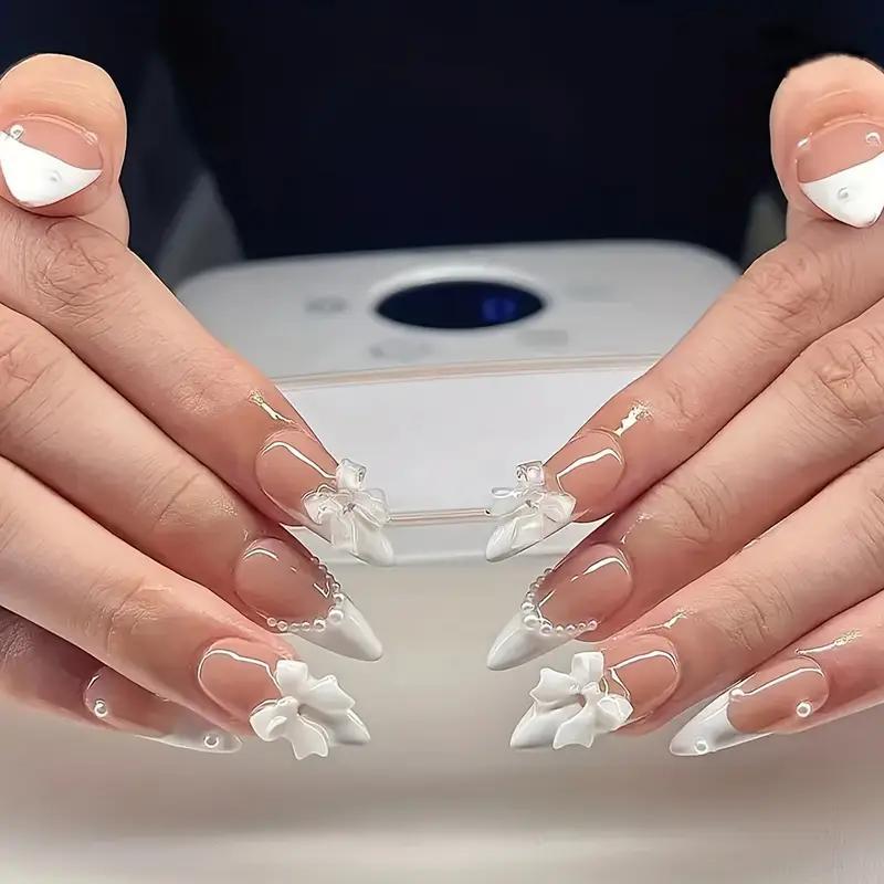 Накладные ногти с объемным дизайном Бант с жемчугом миндаль средней длины с клеевыми пластинами 24 шт. Белый (2789190688) - фото 2