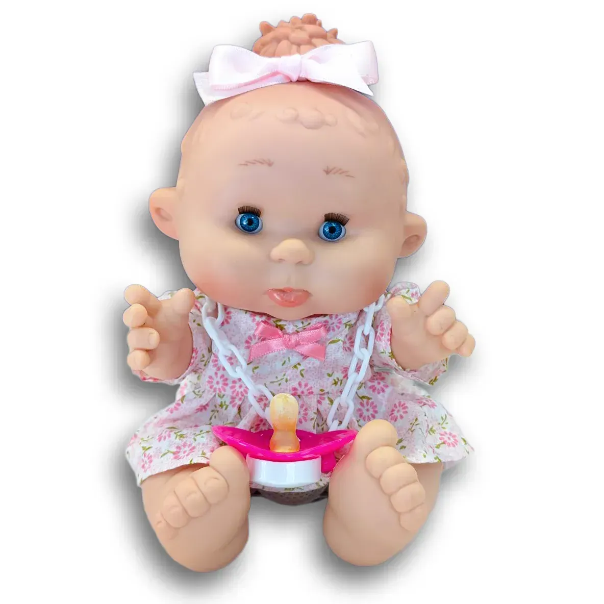 Пупс Nines d`Onil с ароматом ванили из винила в розовом платье с цветками 26 см (150-98-0814.2) Пупс Nines d`Onil с ароматом ванили из винила в розовом платье с цветками 26 см (150-98-0814.2)