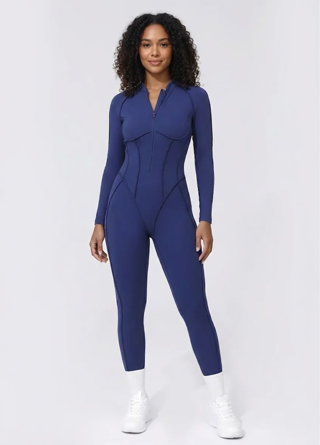 Комбинезон женский спортивный с длинным рукавом и открытой спиной на молнии спереди рельефные наружные швы L Синий (70259/L) Комбинезон женский спортивный с длинным рукавом и открытой спиной на молнии спереди рельефные наружные швы L Синий (70259/L)