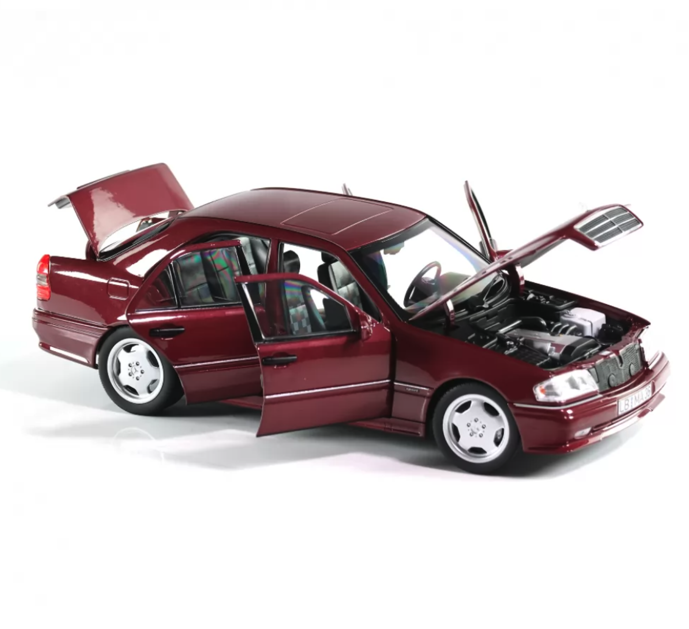 Модель автомобиля Mercedes-Benz C-Class C36 AMG W202 Limousine 1:18 Almandine Red (B66040706) - фото 2