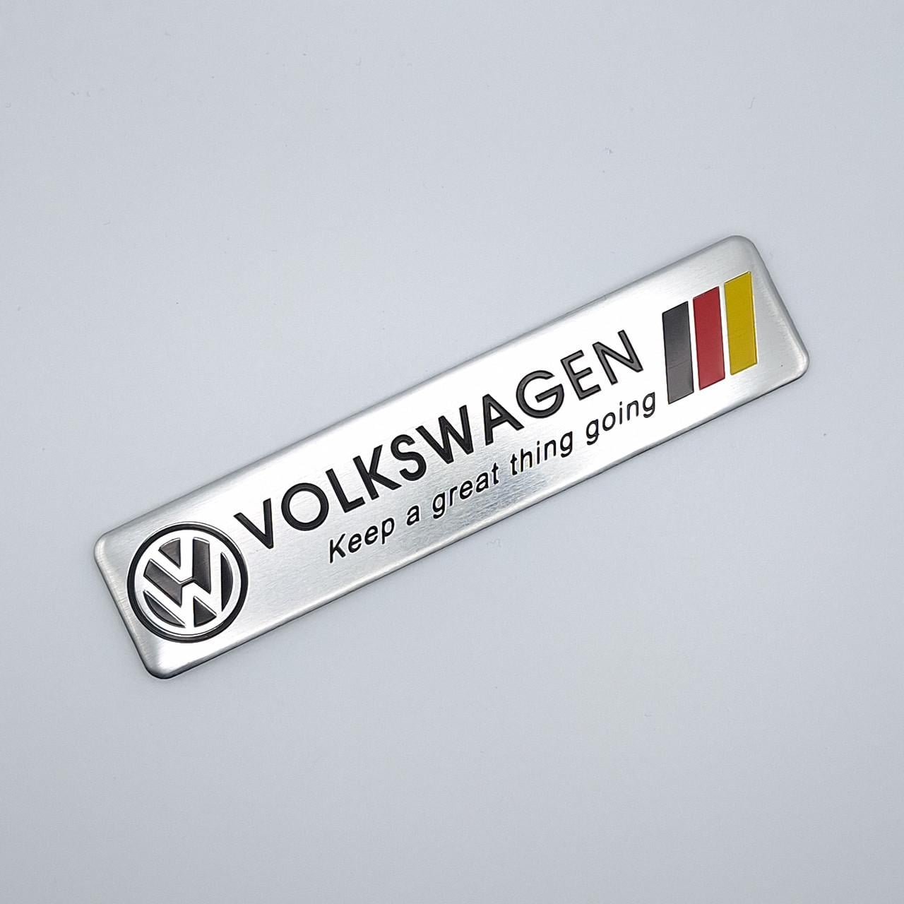 Эмблема алюминиевая Volkswagen Keep a great thing going Германия 12х2,6 см (2035493350)