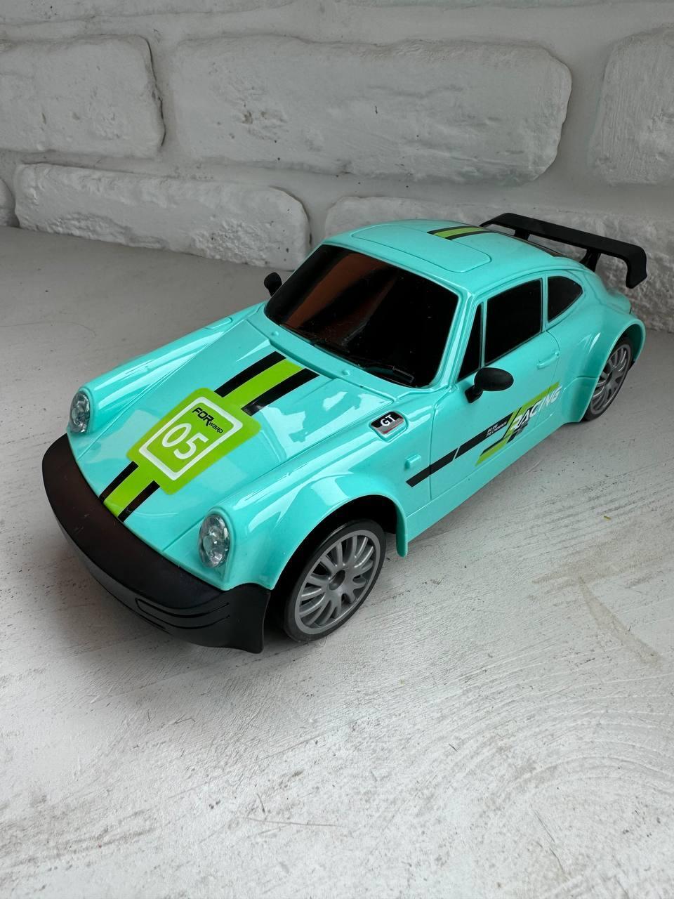 Машинка для дрифта на радиоуправлении полноприводная Fayee 1:20 со светодиодной подсветкой Green (k53-nlq-otu) - фото 3 Машинка для дрифта на радиоуправлении полноприводная Fayee 1:20 со светодиодной подсветкой Green (k53-nlq-otu) - фото 3