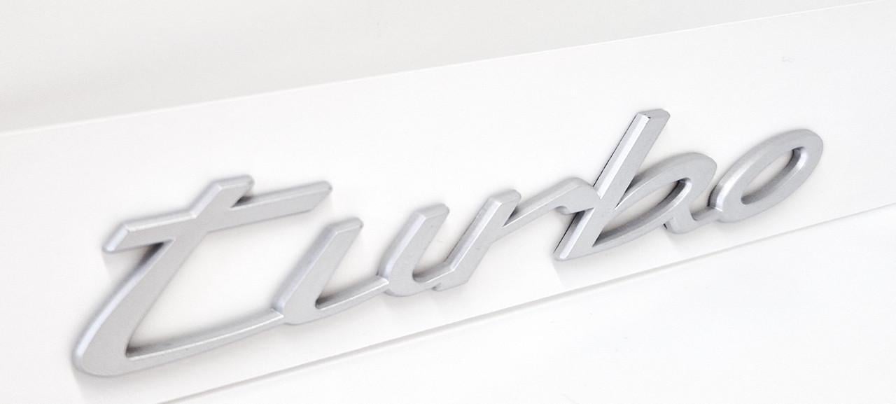 Эмблема-надпись Turbo Porsche на крышку багажника Matt Silver (2341734059)