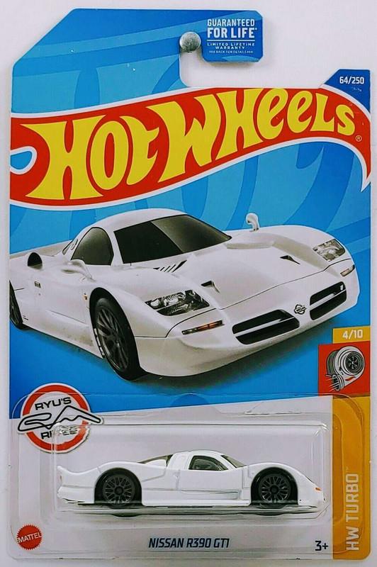 Игрушечная машинка Hot Wheels Nissan R390 GT1 2022 Turbo №064 (HCT77)