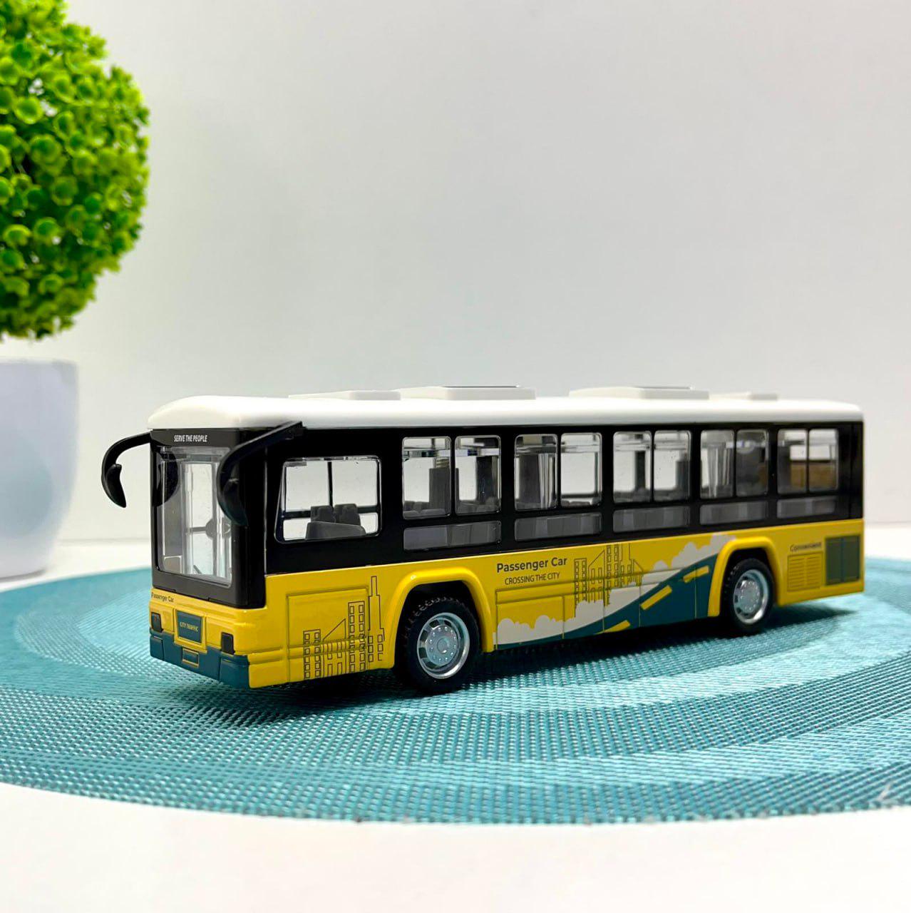 Автобус металлический с инерцией/подсветкой и звуком открывается дверь Желтый (CLM-0771AC) Автобус металлический с инерцией/подсветкой и звуком открывается дверь Желтый (CLM-0771AC)