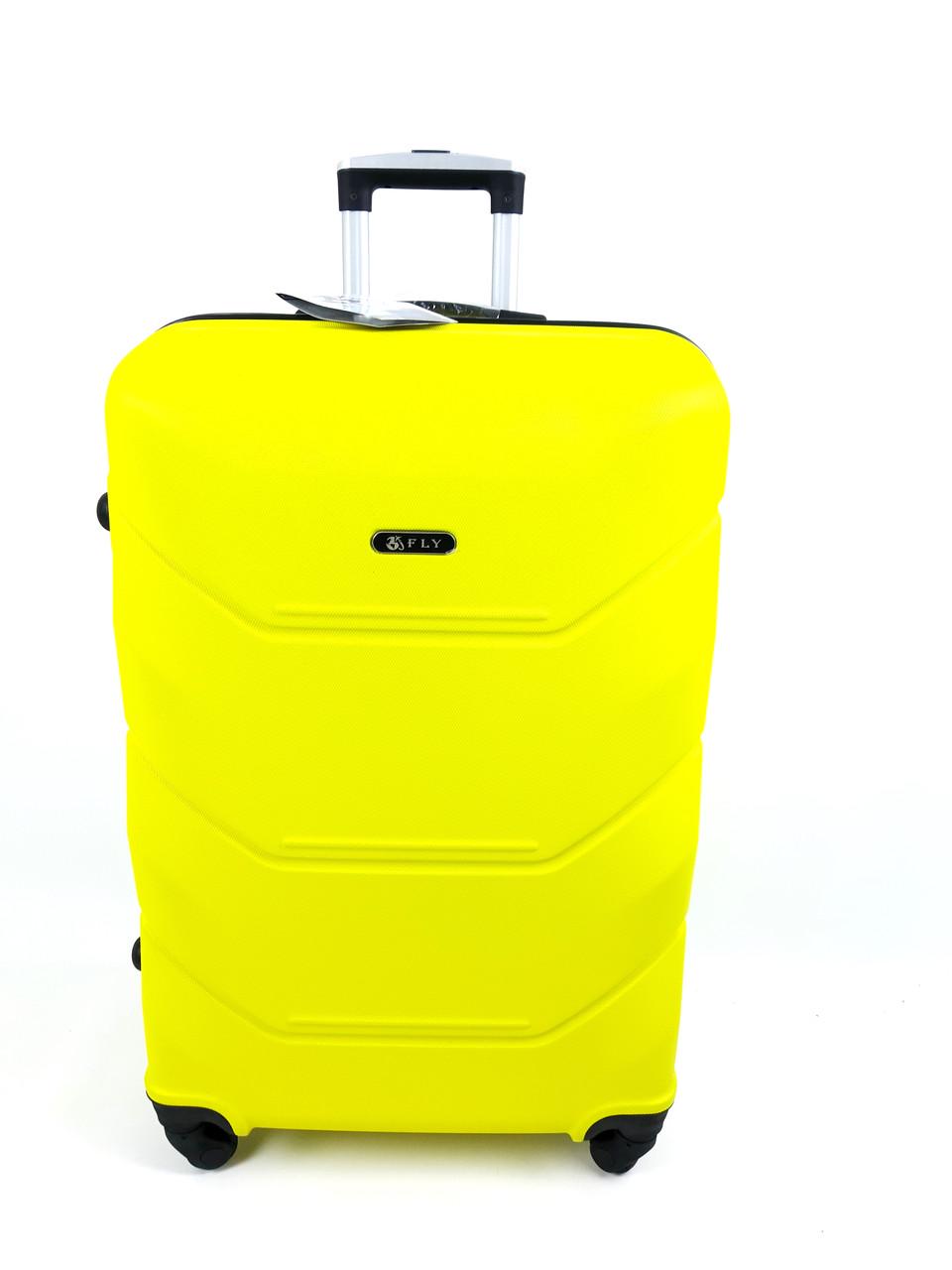 Чемодан пластиковый на 4 колесах Fly 63 л Желтый (1228451905)