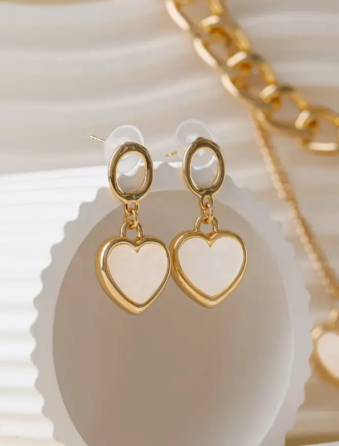 Сережки висячі подовжені Серце Золотистий (70306) Сережки висячі подовжені Серце Золотистий (70306)