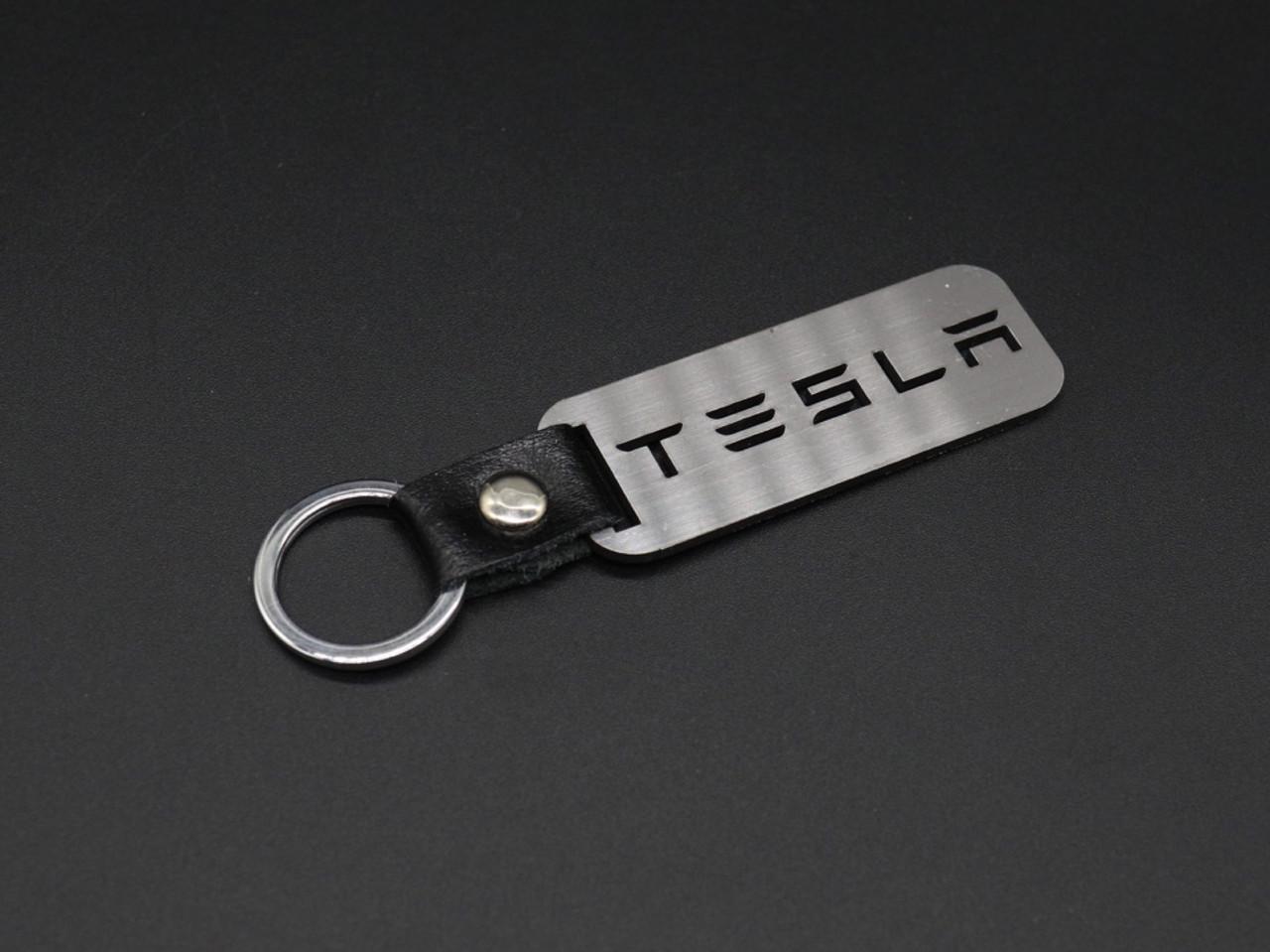 Брелок автомобильный для ключей Tesla 10х2,5 см Серебристый (1145547811) Брелок автомобильный для ключей Tesla 10х2,5 см Серебристый (1145547811)