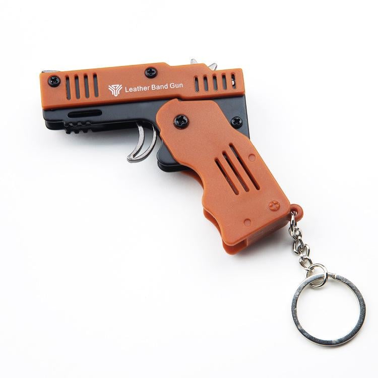 Брелок міні-пістолет стріляє гумками 60 шт. гумок Коричневий (0617)