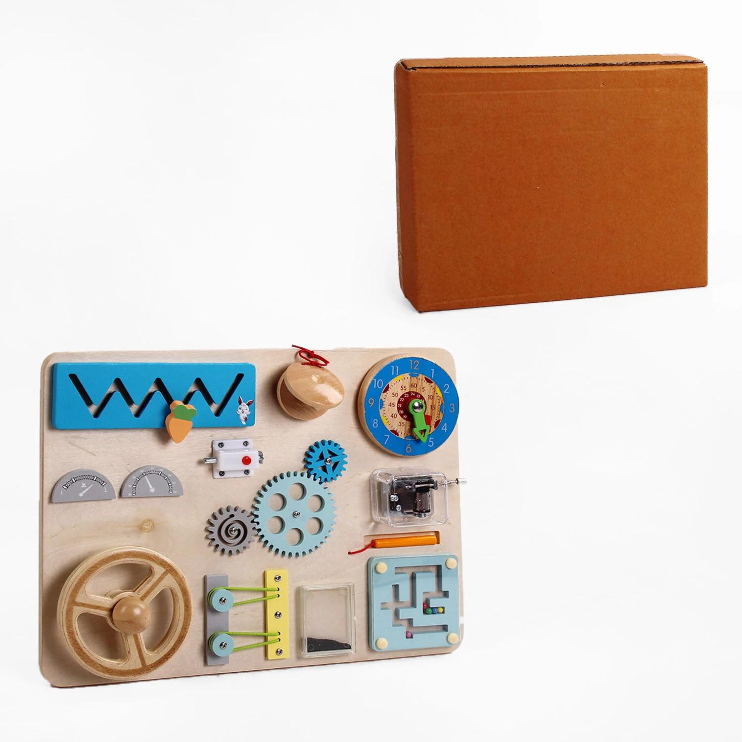 Бізіборд для малюків дерев'яний C 61700/8 11 ігор/кермо/пальчиковий лабіринт/годинник/магнітний олівець/музична скринька (25807149)