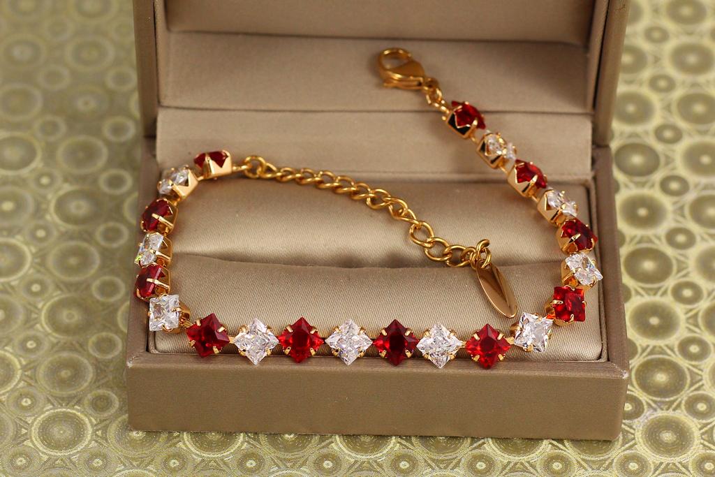 Браслет Xuping Jewelry Ледяные ромбы с белыми и красными камнями 17 см Золотистый (34838827)