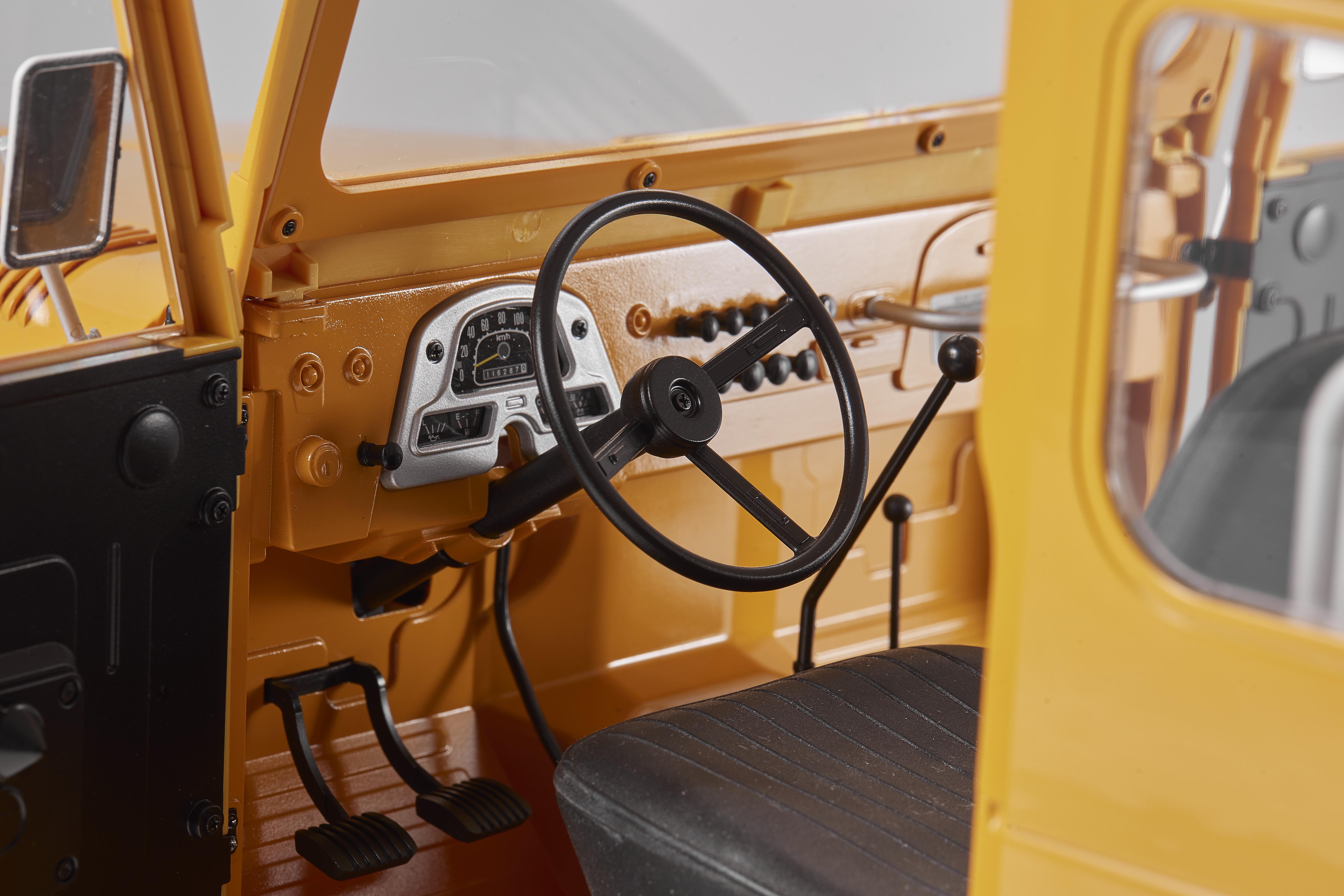 Машинка на радиоуправлении FMS 1:10 Toyota Land Cruiser FJ40 RS Yellow - фото 11 Машинка на радиоуправлении FMS 1:10 Toyota Land Cruiser FJ40 RS Yellow - фото 11