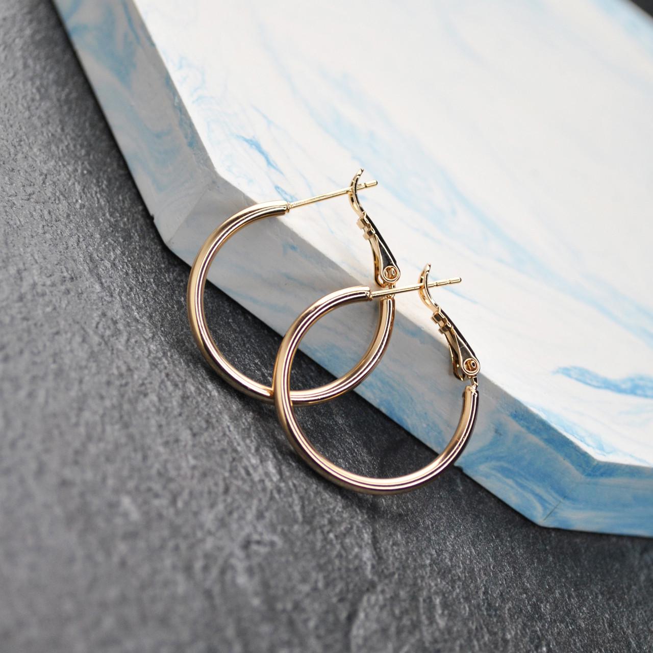 Сережки кольца конго медицинская сталь позолота 2,5 см (x050) Сережки кольца конго медицинская сталь позолота 2,5 см (x050)