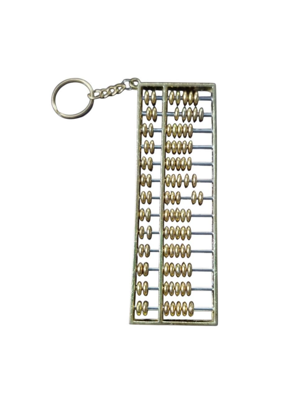 Брелок металлический Счетница абакус 12х4х0,8 см Золотистый Брелок металлический Счетница абакус 12х4х0,8 см Золотистый