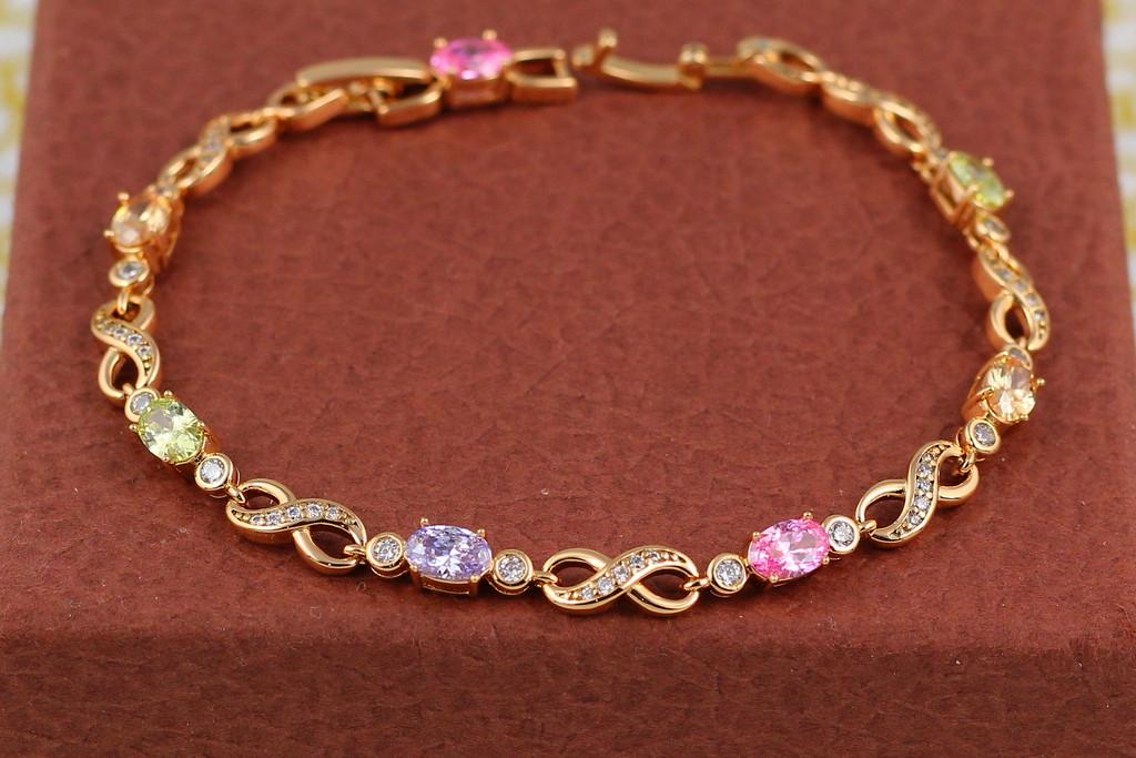 Браслет Xuping Jewelry Восьмерки с разноцветными овальными камнями 17 см 6 мм Золотистый (1674661533)