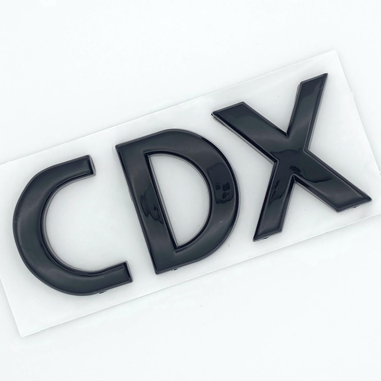 Эмблема надпись CDX Chevrolet 7х2,7 см ABS Черный глянцевый (3036138047)