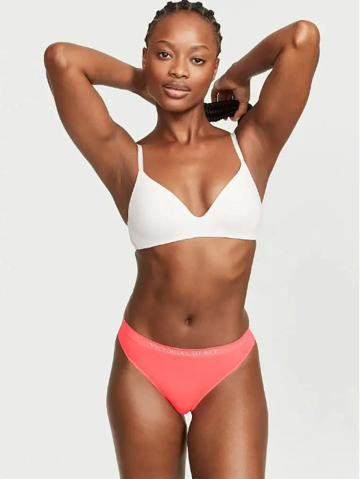 Трусики женские стринги Victoria's Secret Seamless Thong М Оранжевый (2094989510)