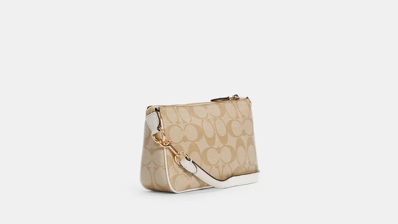 Сумка женская Coach Nolita 19 In Signature Canvas Бежевый Light Khaki/Chalk - фото 2