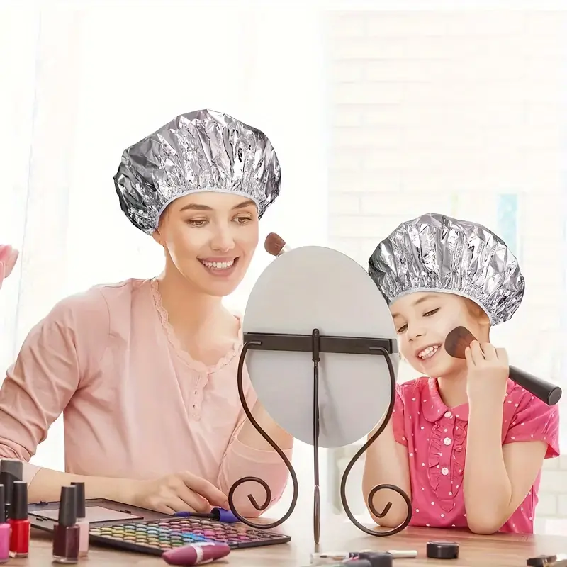 Шапочка для волосся з алюмінієвої фольги на еластичній резинці 1 шт. Сріблястий - фото 4 Шапочка для волосся з алюмінієвої фольги на еластичній резинці 1 шт. Сріблястий - фото 4