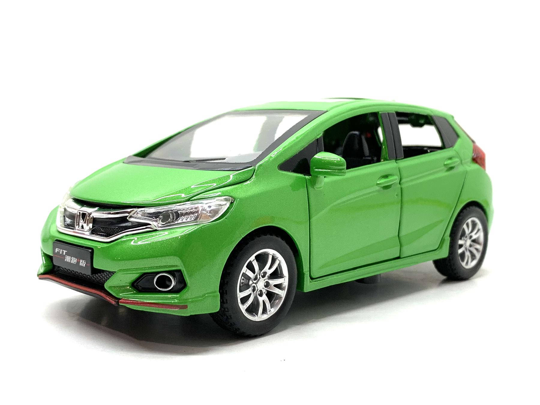 Машинка металлическая TK Union Honda fit 1:32 свет/звук/открываются двери Вид 2 Зеленый (GT-04600)