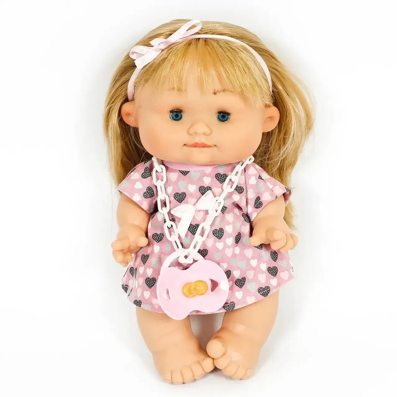 Пупс Nines d`Onil с ароматом ванили из винила в розовом платье с сердечками 26 см (150-98-0804.1) Пупс Nines d`Onil с ароматом ванили из винила в розовом платье с сердечками 26 см (150-98-0804.1)